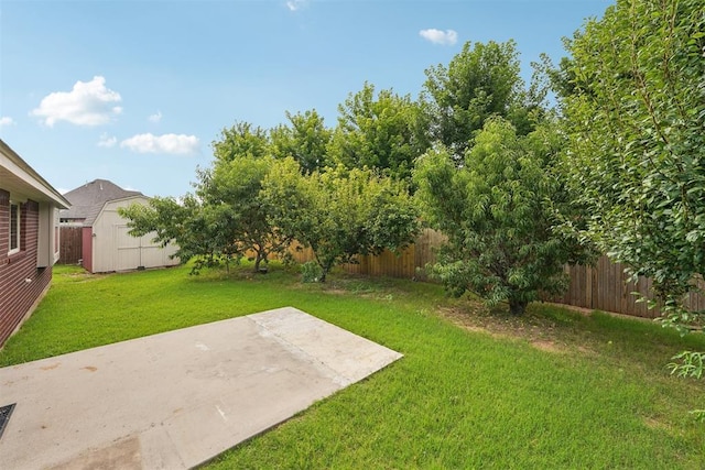9716 SW 21st Ter, Oklahoma City, OK 73128 - fenced backyard with a storage unit and a patio area