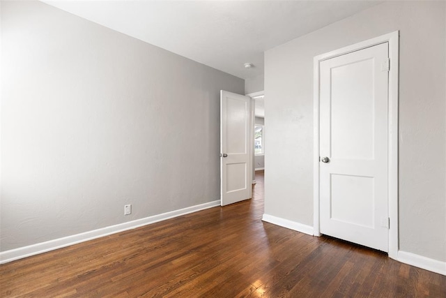 3919 SE 10th Pl, Oklahoma City, OK 73115 - unfurnished bedroom with baseboards and wood finished floors