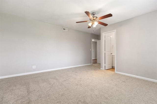3919 SE 10th Pl, Oklahoma City, OK 73115 - spare room with light carpet and a ceiling fan