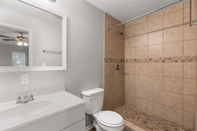 3919 SE 10th Pl, Oklahoma City, OK 73115 - bathroom with vanity, a ceiling fan, and a tile shower