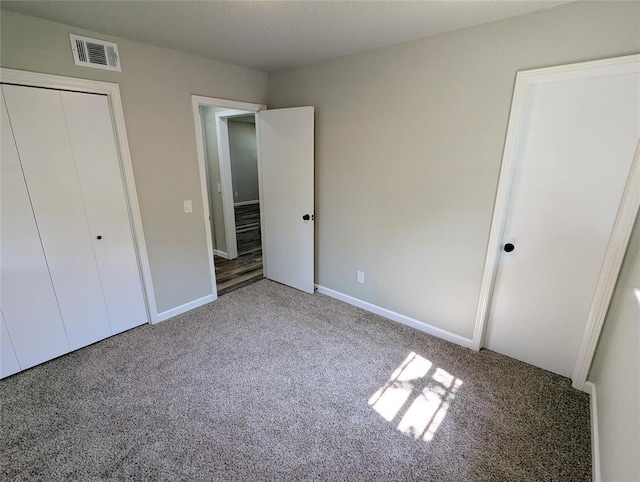 104 SW 10th St, Moore, OK 73160 - unfurnished bedroom featuring carpet floors and a closet