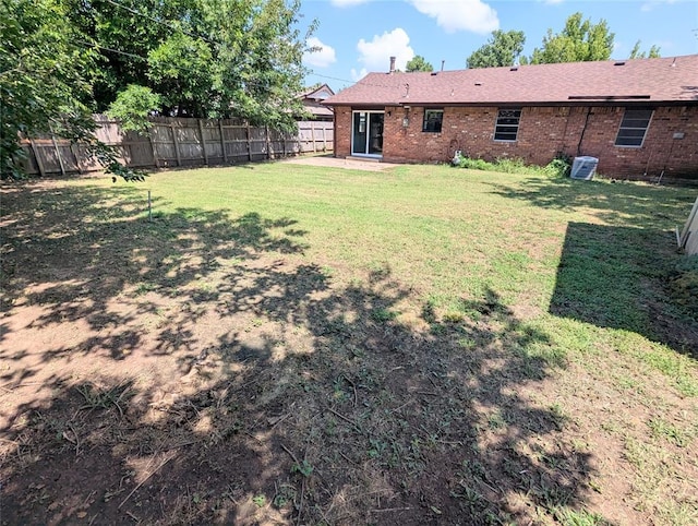 104 SW 10th St, Moore, OK 73160 - fenced backyard featuring a patio area