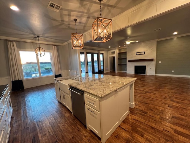 17566 N County Road 3190, Pauls Valley, OK 73075 - kitchen featuring a chandelier, dishwasher, ornamental molding, white cabinets, and dark wood finished floors