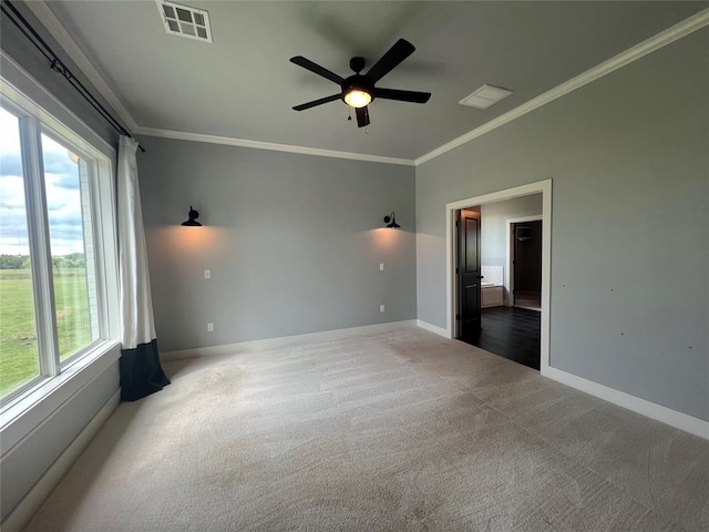 17566 N County Road 3190, Pauls Valley, OK 73075 - carpeted spare room with ornamental molding and a ceiling fan