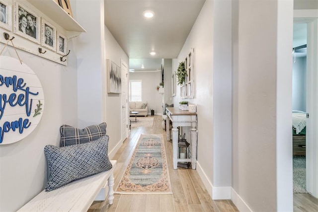 10125 NW 99th St, Yukon, OK 73099 - hall featuring light wood finished floors and recessed lighting