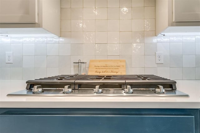 10125 NW 99th St, Yukon, OK 73099 - kitchen view of backsplash and stainless steel gas cooktop