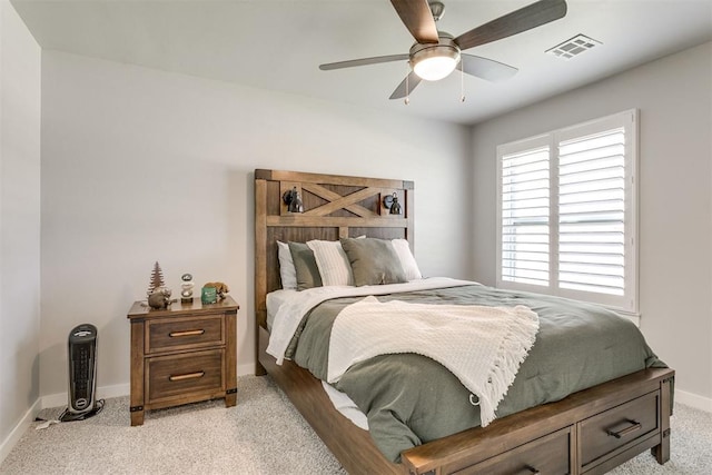 10125 NW 99th St, Yukon, OK 73099 - bedroom featuring light carpet and a ceiling fan