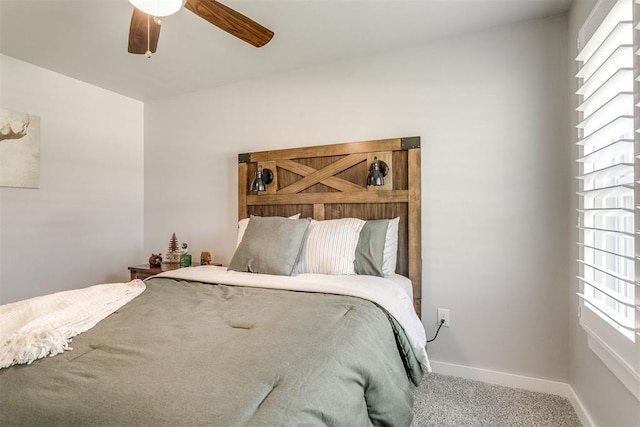 10125 NW 99th St, Yukon, OK 73099 - carpeted bedroom featuring baseboards and a ceiling fan