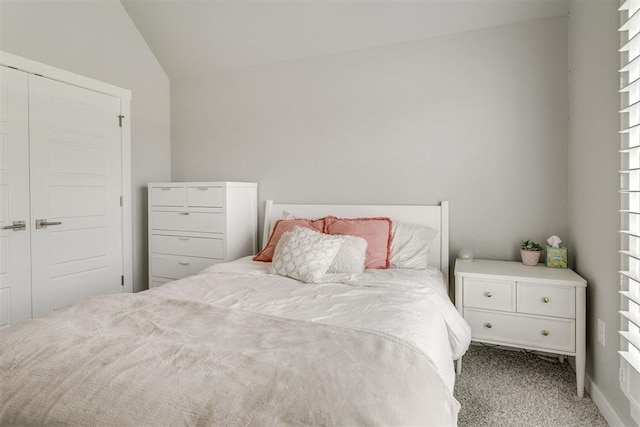 10125 NW 99th St, Yukon, OK 73099 - carpeted bedroom featuring vaulted ceiling