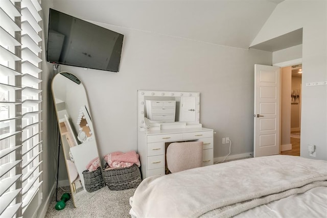 10125 NW 99th St, Yukon, OK 73099 - bedroom featuring lofted ceiling and baseboards