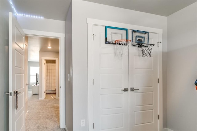 10125 NW 99th St, Yukon, OK 73099 - hall featuring light colored carpet and baseboards