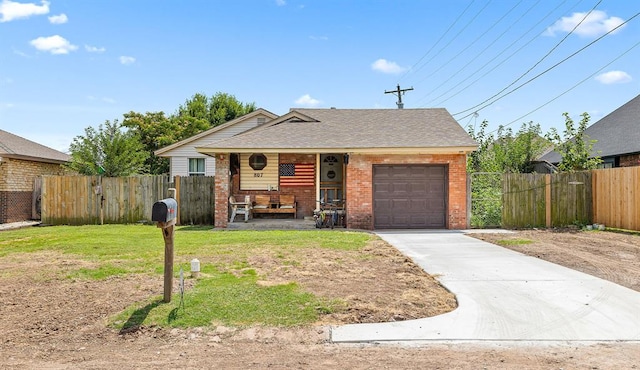 807 Thompson Dr, El Reno, OK 73036 - view of front of property with brick siding, driveway, covered porch, an attached garage, and roof with shingles