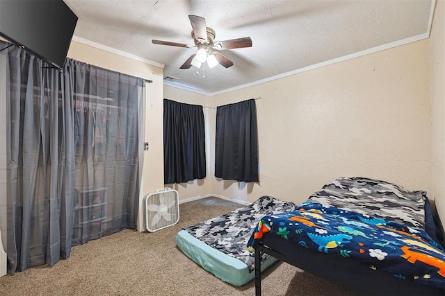 807 Thompson Dr, El Reno, OK 73036 - bedroom with carpet floors, crown molding, and ceiling fan