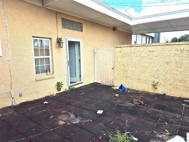 4300 N Butler Pl, Oklahoma City, OK 73118 - view of patio featuring a gate