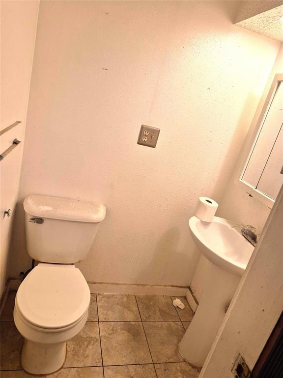4300 N Butler Pl, Oklahoma City, OK 73118 - bathroom with toilet and tile patterned flooring