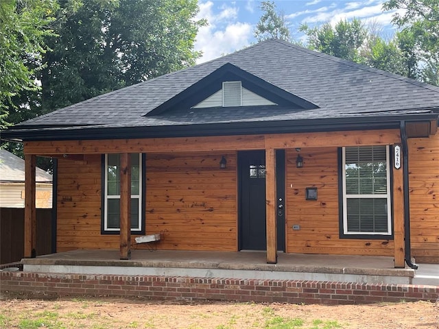 2416 S Shartel Ave, Oklahoma City, OK 73109 - view of front facade with a shingled roof and covered porch