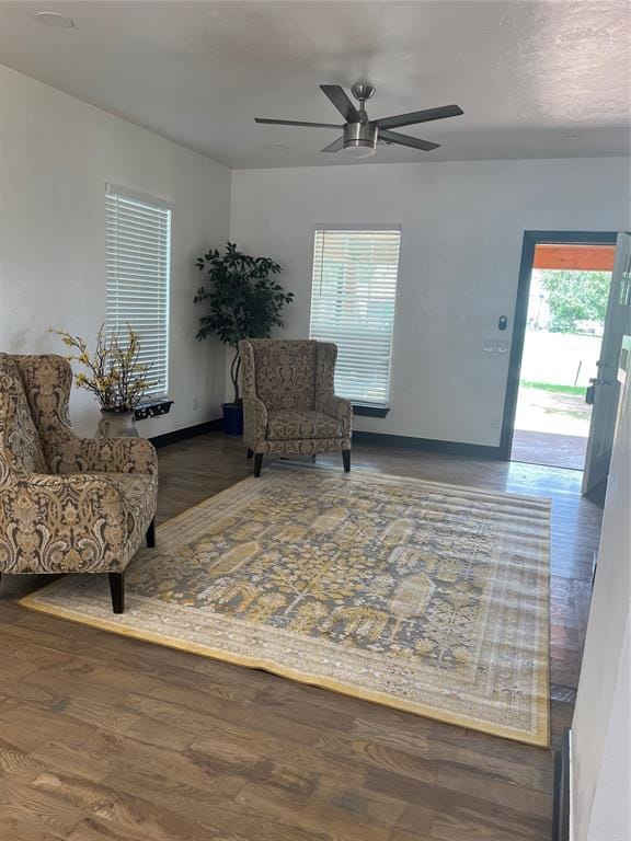 2416 S Shartel Ave, Oklahoma City, OK 73109 - living area with a ceiling fan and wood finished floors
