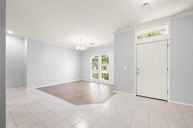 544 NW 172nd Pl Unit 8015998877, Edmond, OK 73012 - foyer featuring a chandelier, crown molding, and light tile patterned floors