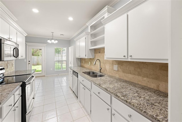 544 NW 172nd Pl Unit 8015998877, Edmond, OK 73012 - kitchen featuring appliances with stainless steel finishes, open shelves, ornamental molding, a chandelier, and white cabinetry