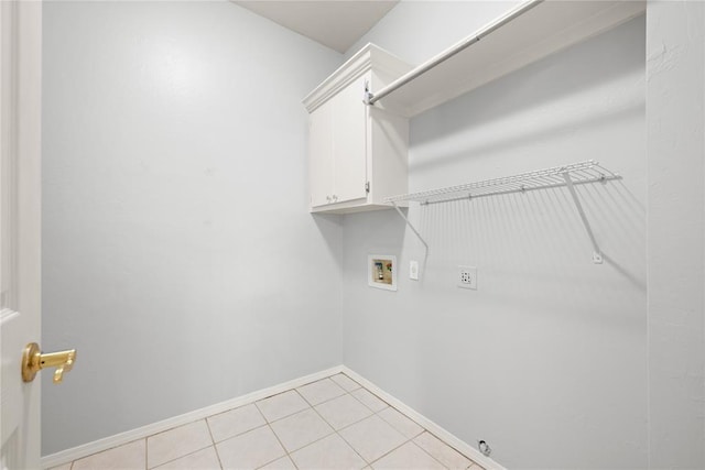 544 NW 172nd Pl Unit 8015998877, Edmond, OK 73012 - laundry room with cabinet space, hookup for a washing machine, and light tile patterned floors