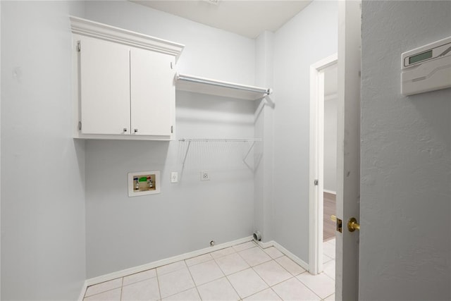 544 NW 172nd Pl Unit 8015998877, Edmond, OK 73012 - laundry area featuring washer hookup, cabinet space, light tile patterned flooring, and hookup for a gas dryer