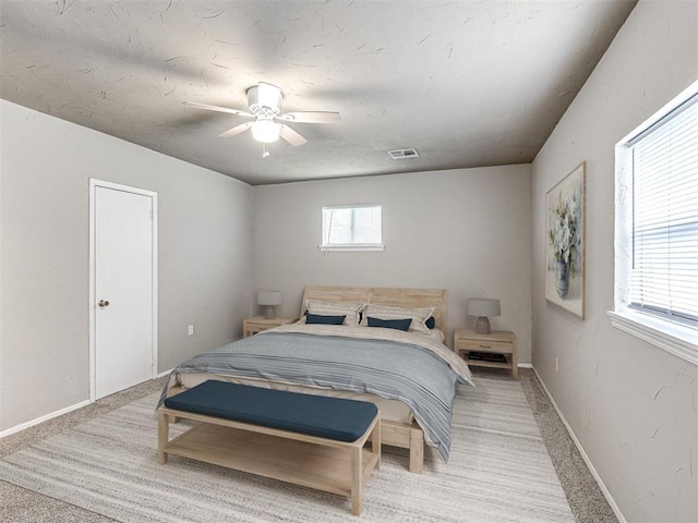 6604 NW 32nd St, Bethany, OK 73008 - bedroom featuring light colored carpet and a ceiling fan