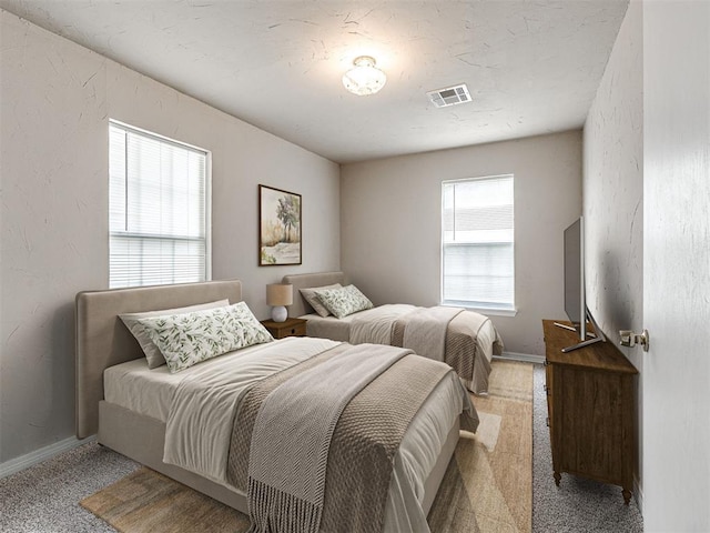 6604 NW 32nd St, Bethany, OK 73008 - bedroom with light carpet and baseboards