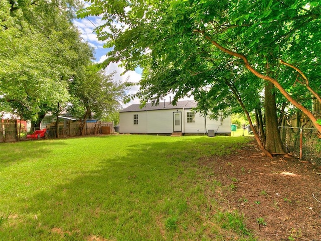 1513 Rancho Dr, Oklahoma City, OK 73119 - fenced backyard featuring entry steps