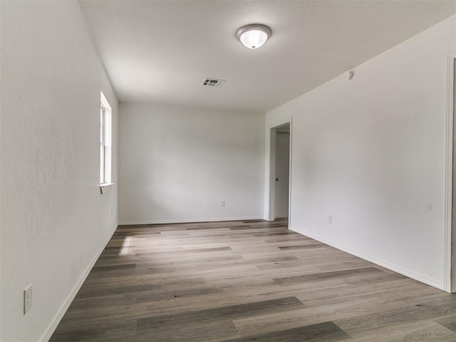 1513 Rancho Dr, Oklahoma City, OK 73119 - spare room with wood finished floors