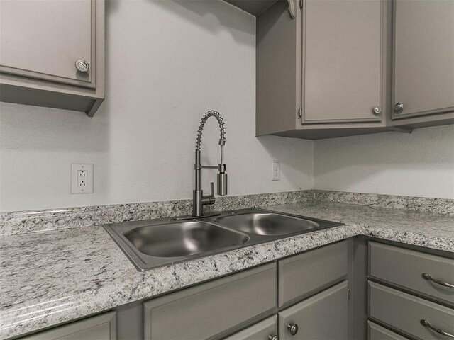 1513 Rancho Dr, Oklahoma City, OK 73119 - kitchen featuring gray cabinetry and light countertops