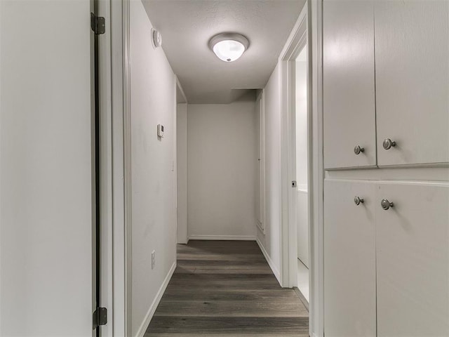 1513 Rancho Dr, Oklahoma City, OK 73119 - corridor with dark wood-style flooring and baseboards