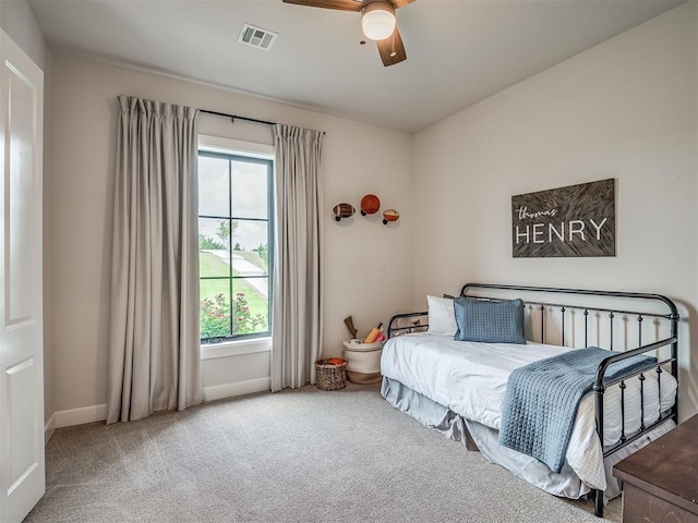 19890 Hickory Ridge Rd, Arcadia, OK 73007 - carpeted bedroom with multiple windows and a ceiling fan