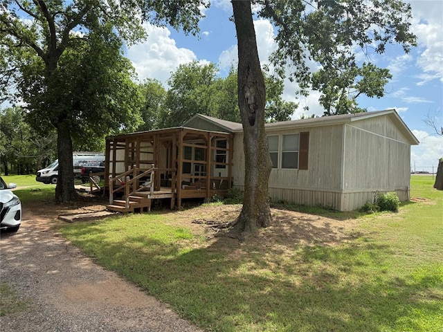 4620 SE 119th St, Oklahoma City, OK 73165 - view of front of home with a front yard and a deck