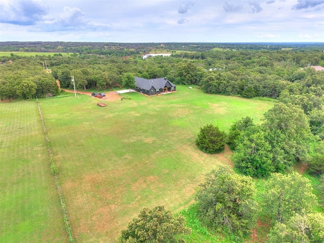 11275 S Henney Rd, Meridian, OK 73058 - view of subject property with a heavily wooded area