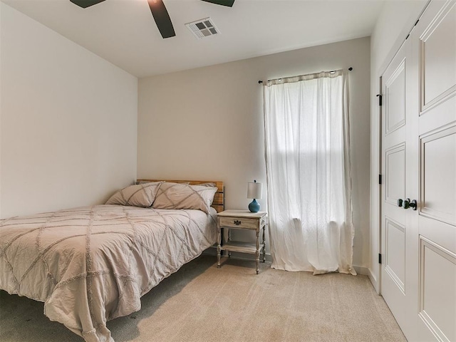 11275 S Henney Rd, Meridian, OK 73058 - bedroom with light colored carpet and ceiling fan