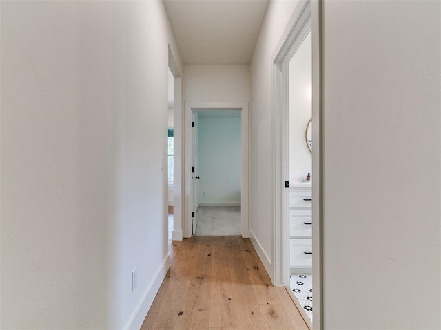 11275 S Henney Rd, Meridian, OK 73058 - hall featuring light wood-style flooring and baseboards