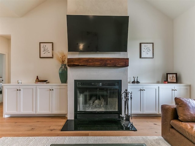 11275 S Henney Rd, Meridian, OK 73058 - detailed view of wood finished floors and a large fireplace