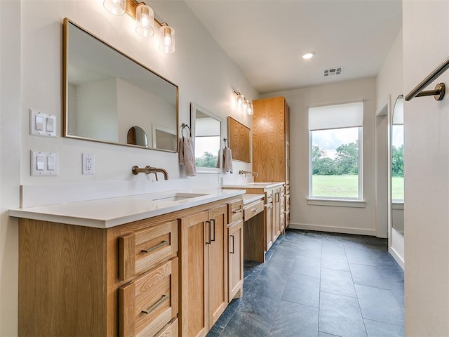 11275 S Henney Rd, Meridian, OK 73058 - bathroom featuring double vanity and recessed lighting