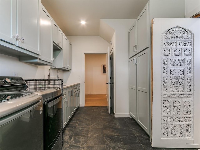 11275 S Henney Rd, Meridian, OK 73058 - kitchen with independent washer and dryer, light countertops, and recessed lighting
