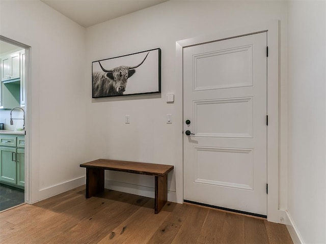 11275 S Henney Rd, Meridian, OK 73058 - doorway to outside featuring wood finished floors