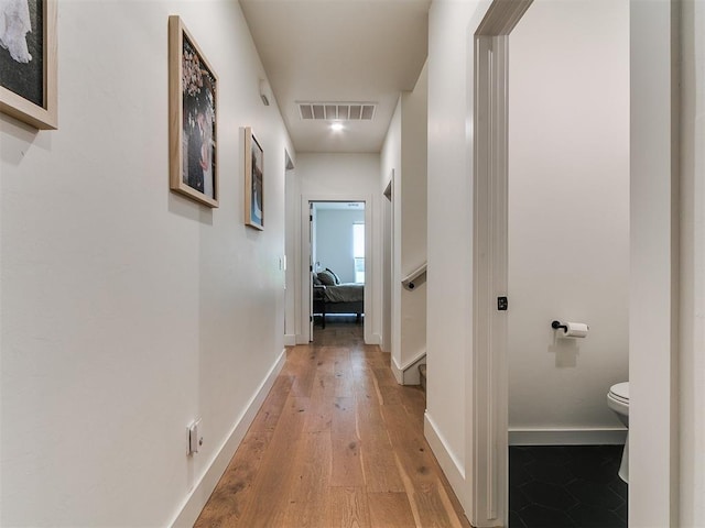 11275 S Henney Rd, Meridian, OK 73058 - hallway featuring light wood finished floors and baseboards