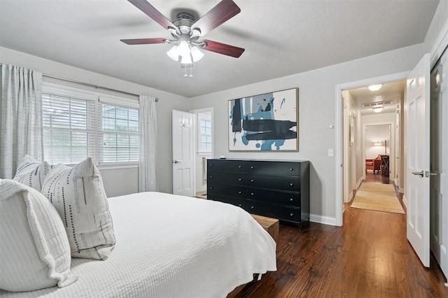 2633 Chaucer Dr, The Village, OK 73120 - bedroom with wood finished floors and ceiling fan