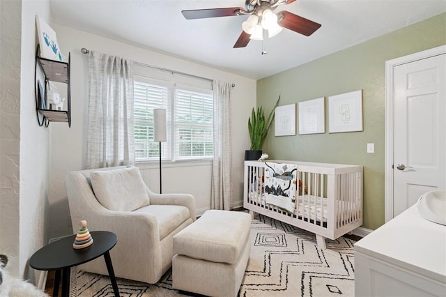 2633 Chaucer Dr, The Village, OK 73120 - bedroom with a nursery area and a ceiling fan