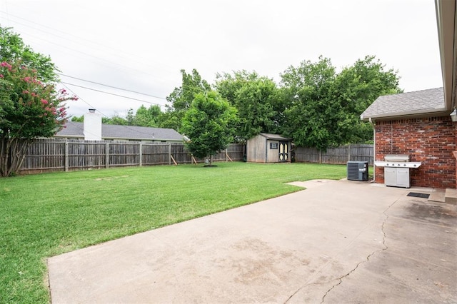 2633 Chaucer Dr, The Village, OK 73120 - fenced backyard featuring a patio and a storage shed