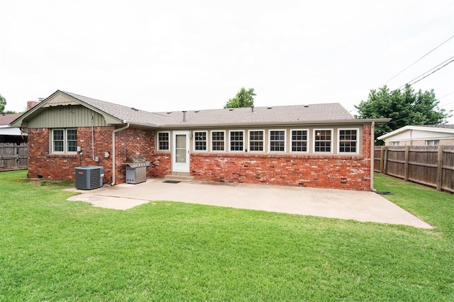 2633 Chaucer Dr, The Village, OK 73120 - back of property featuring brick siding, a patio, and entry steps
