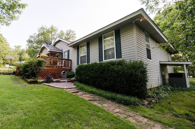 207 S Mcclure Ave, Pauls Valley, OK 73075 - view of home's exterior featuring a deck and a yard