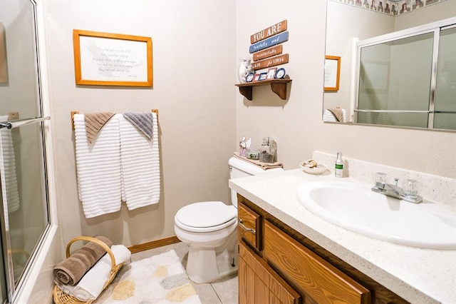 207 S Mcclure Ave, Pauls Valley, OK 73075 - bathroom with a shower with shower door, vanity, and tile patterned flooring