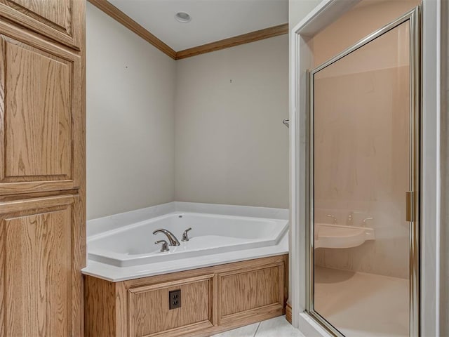 1602 N Davis Ave, Oklahoma City, OK 73127 - full bathroom with a stall shower, a garden tub, and ornamental molding