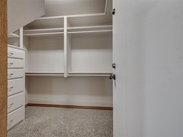 1602 N Davis Ave, Oklahoma City, OK 73127 - walk in closet with carpet floors