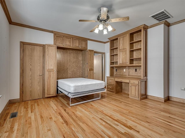 1602 N Davis Ave, Oklahoma City, OK 73127 - bedroom with light wood-style flooring, ornamental molding, a ceiling fan, and an office area